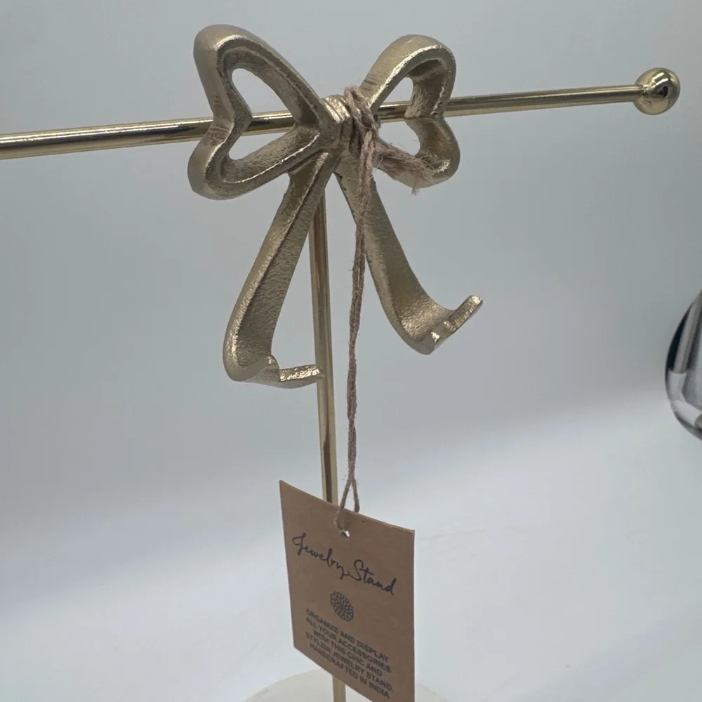 Gold Bow Jewelry Stand with White Marble Base